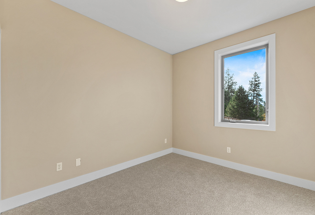 Bedroom upstairs — Spacious prairie-style home with ADU