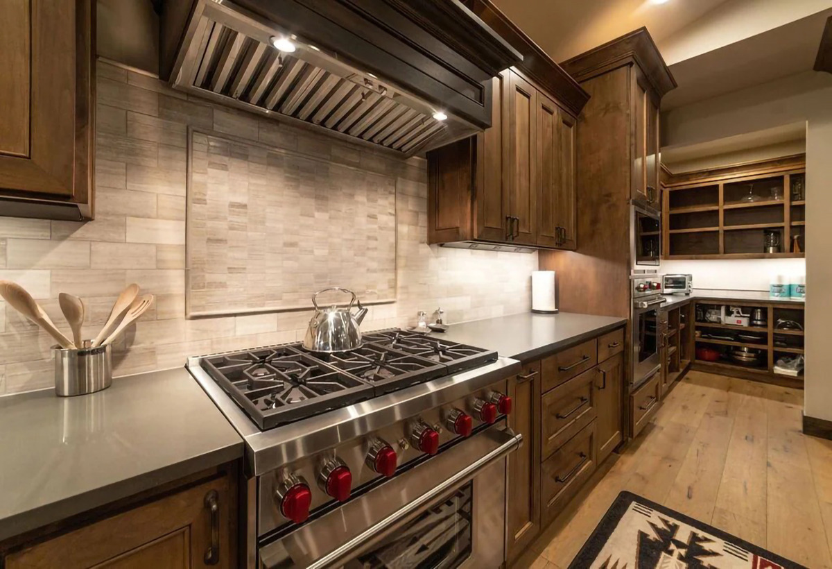 Kitchen stove hood ranch — Luxury home with sweeping mountain views