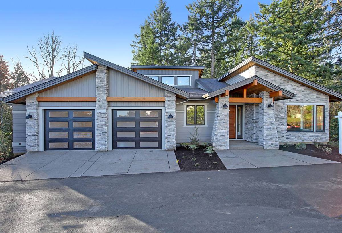 Exterior of the Eastridge Lane custom home on a wooded Lake Oswego ridge