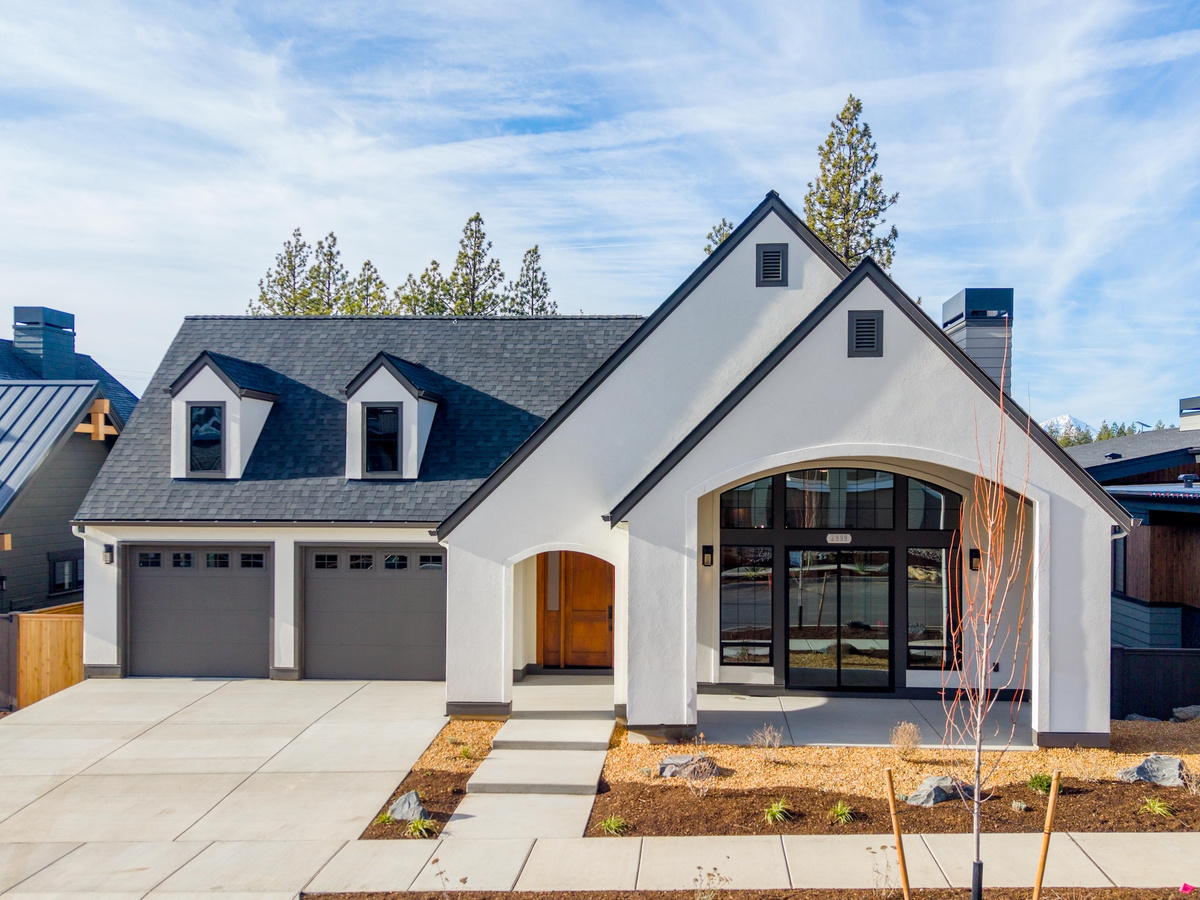Exterior of the updated Tudor custom home with ADU on Talline Lot 45 in Bend, Oregon